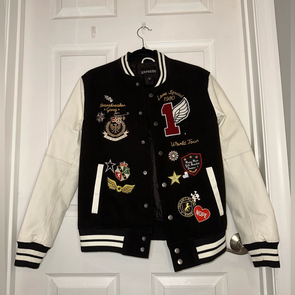 Rare vintage Express varsity jacket with patches and pins!